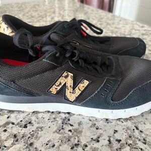 New Balance Black and Leopard Sneakers